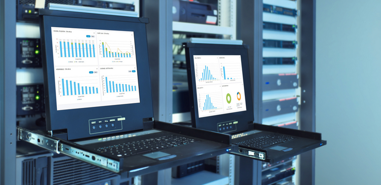 Server room with diagnostics software running on laptops analysis